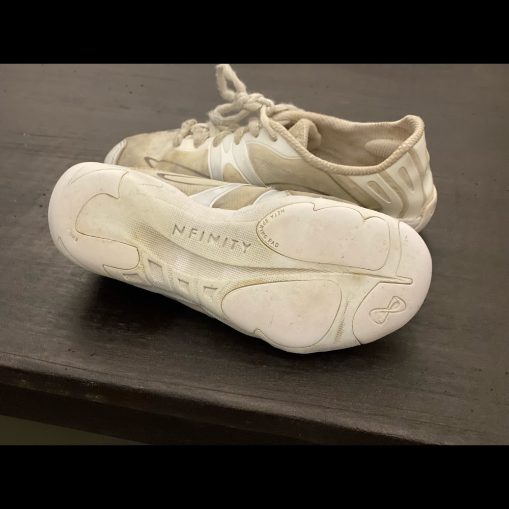 Nfinity vengeance size 4. Cheer shoes
